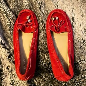 Redish orange suze 8 Michael Kors moccasin style flats.